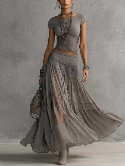 Completo Con Top Grigio In Pizzo Trasparente E Gonna Maxi Plissettata
